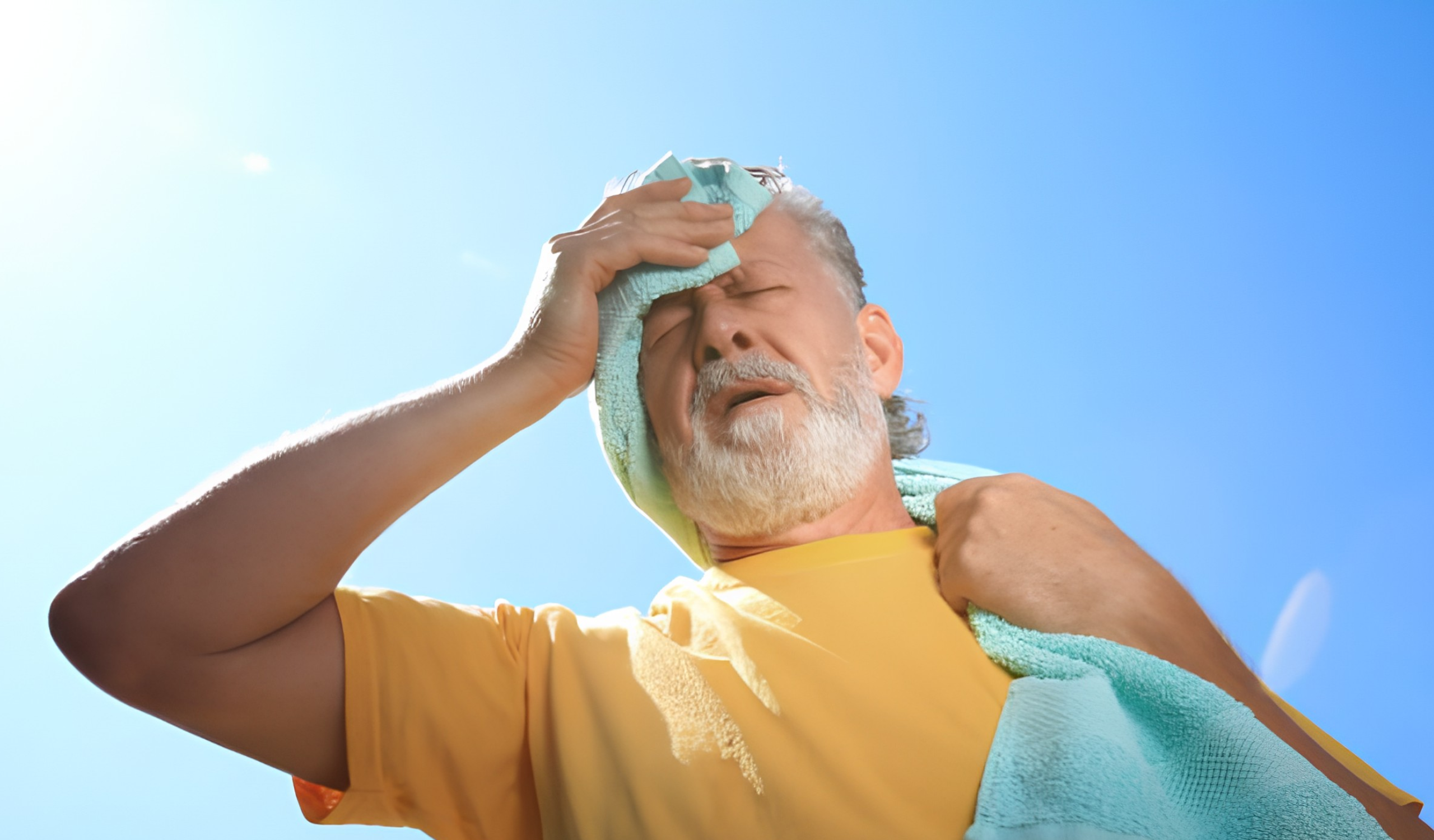 Personne âgée souffrant de la chaleur lors d'une forte canicule.